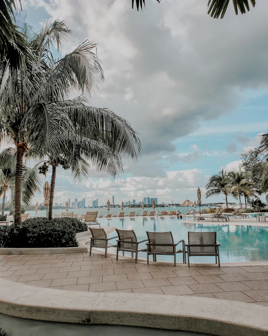 Pool deck and lounge chairs overlooking the Gulf
